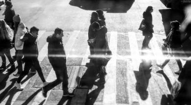 People walking on street crosswalk